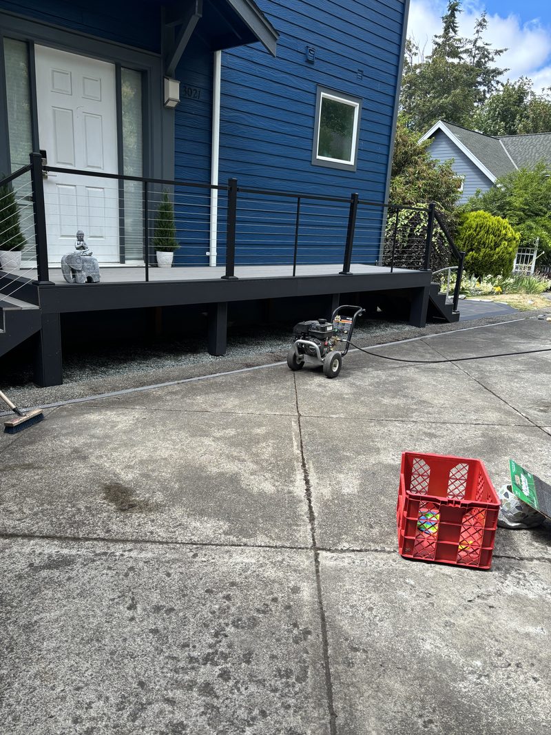 Composite deck with black cable railing built by ZNS